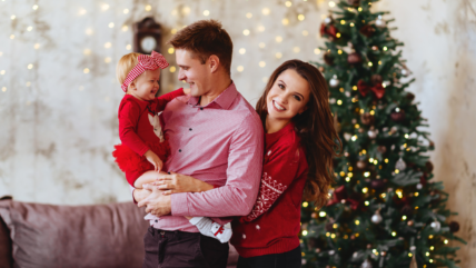 mom and dad with baby, holiday season