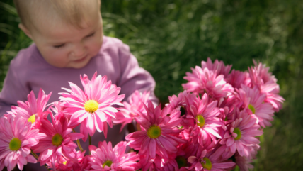 baby with flowers, Nurturing Little Blossoms: Dr. Reyna's Guide to Safely Navigating Allergy Season with Your Baby