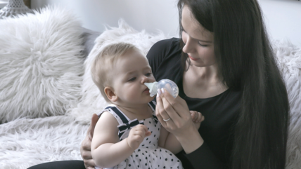 mom and baby using dr. rose's nasal aspirator